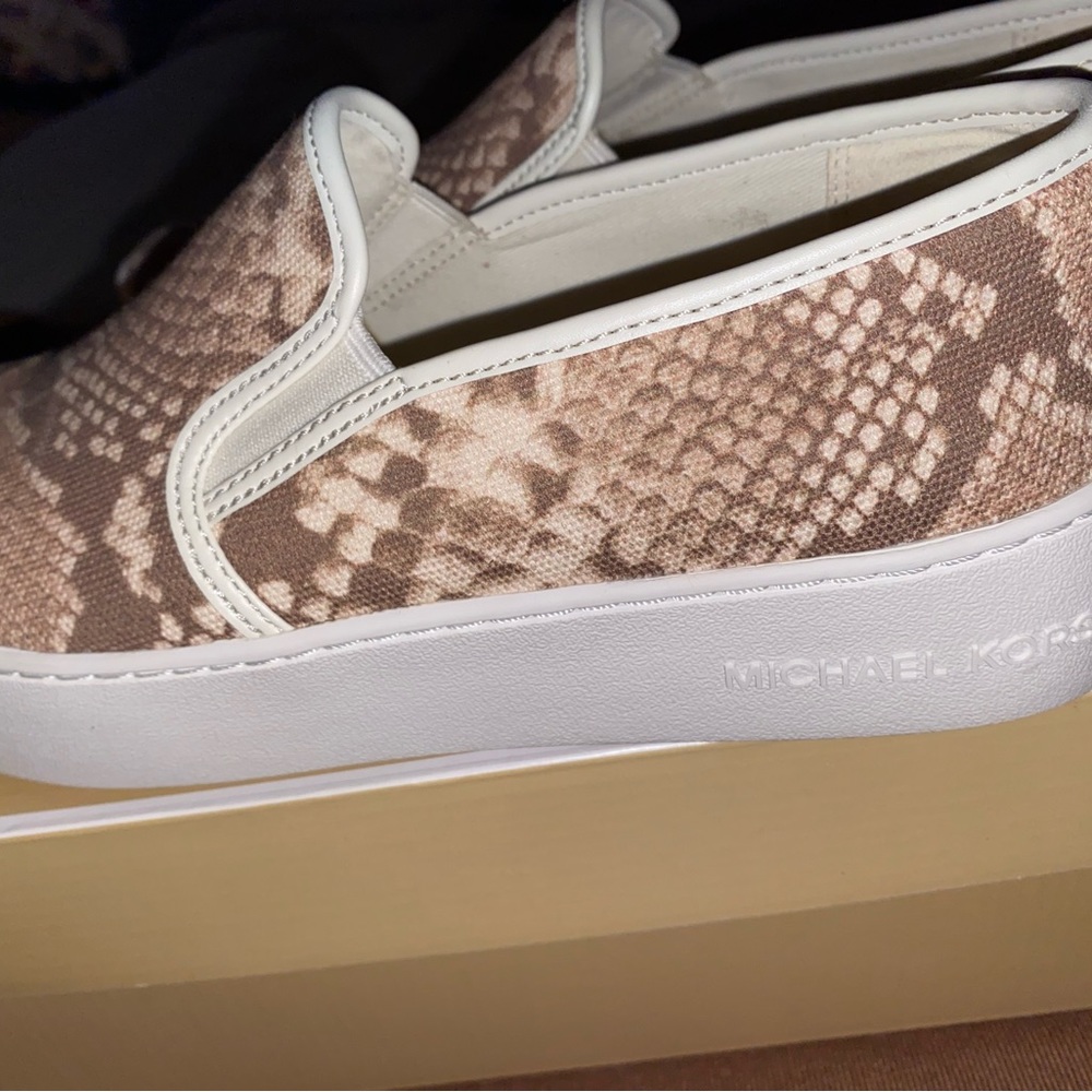 Brand New with box. Michael Kors "TEDDI" canvas slip on tennis.